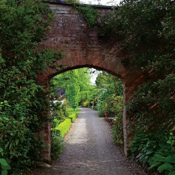 Ireland: Ireland, The Dromoland Castle Very Green Walled Garden Path Through A Brick Archway. by Marilyn Parver