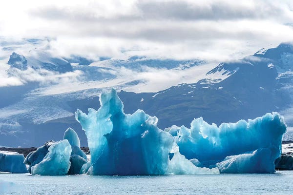 Iceland: Iceland, Floating Glaciers Form Blue Ice Sculptures In Jokulsarlon, Glacier Lagoon. by Mark Williford