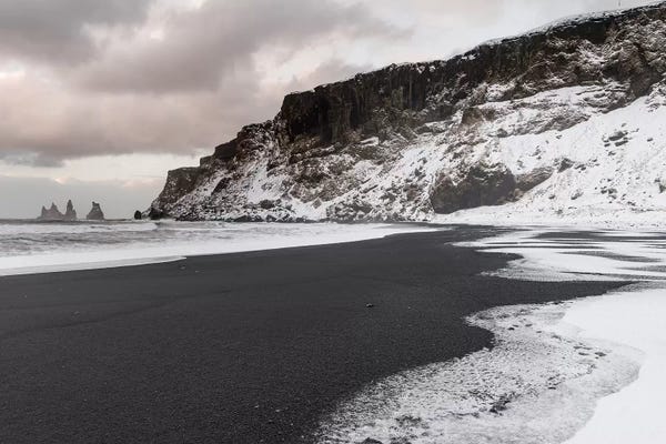 Coast Near Vik Y Myrdal During Winter. Black Volcanic Beach With The Sea Stacks Reynisdrangar, Iceland.
