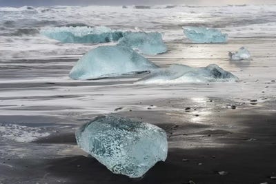 Icebergs On Black Volcanic Beach, Iceland. by Martin Zwick framed wall art