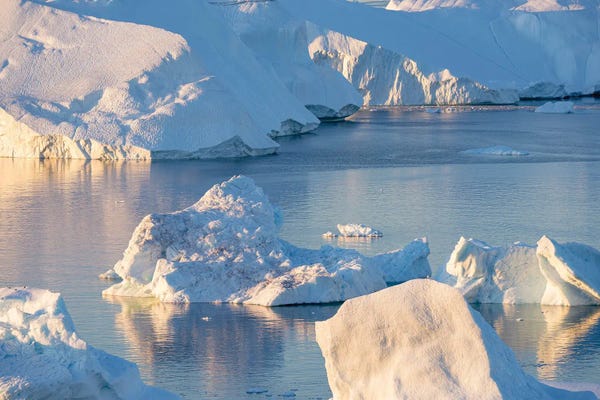 Greenland: Iceberg in the Uummannaq Fjord System, Greenland, Danish overseas colony. by Martin Zwick