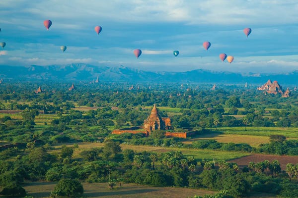 Hot Air Balloons: Hot air balloons, morning view of the temples of Bagan, Myanmar. by Michele Niles