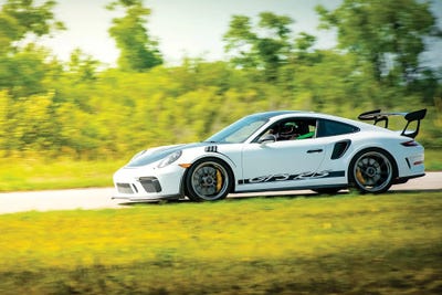 White Porsche Gt3 Rs In Motion by Nik Rave framed canvas print