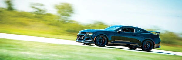 Chevrolet: Blue Chevrolet Camaro In Motion by Nik Rave