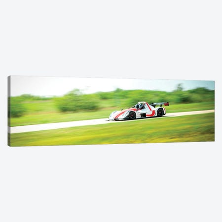 White & Red Formula 1 On The Track In Motion Canvas Print #NRV223} by Nik Rave Canvas Wall Art