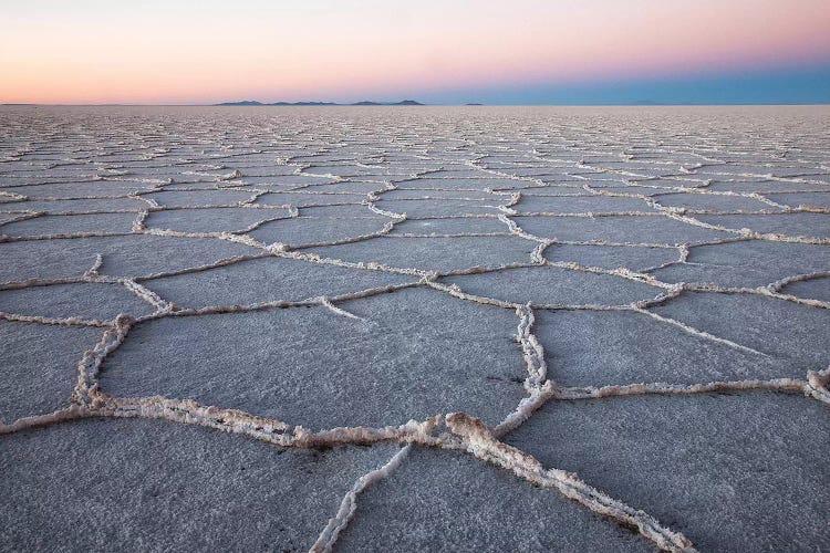 The largest salt flats in the world located in Uyuni, bolivia as the sun is rising in winter.