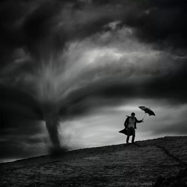 Umbrellas: Man In The Wind by Radovan Skohel