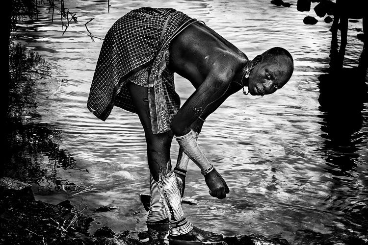 Surma Tribe Woman Washing Up Her Jewelry - Ethiopia