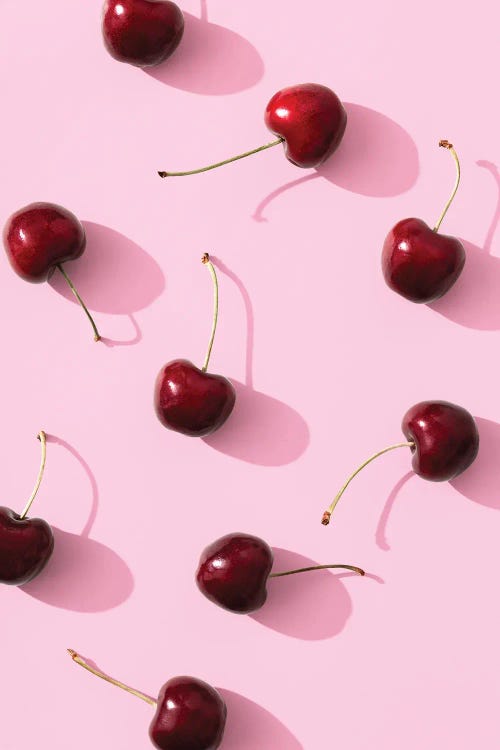 Cherries On Pink Background