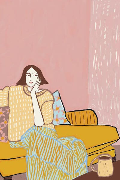 Thoughtful Woman On Sofa