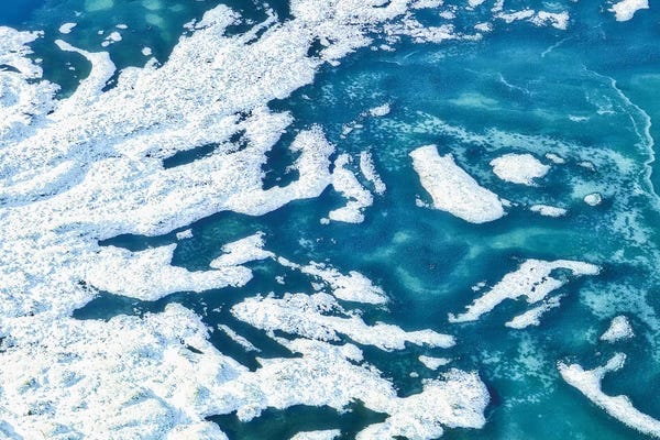 Glaciers & Icebergs: Glacier Meets The Sea by Mark Paulda