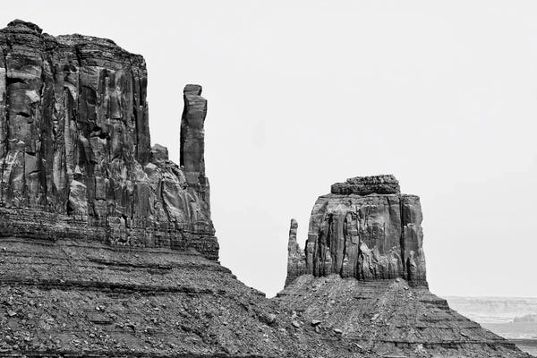 Monument Valley: West And East Mitten Butte Monument Valley by Philippe Hugonnard