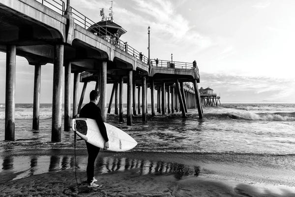 Huntington Beach: Huntington Beach Pier Surfer by Philippe Hugonnard