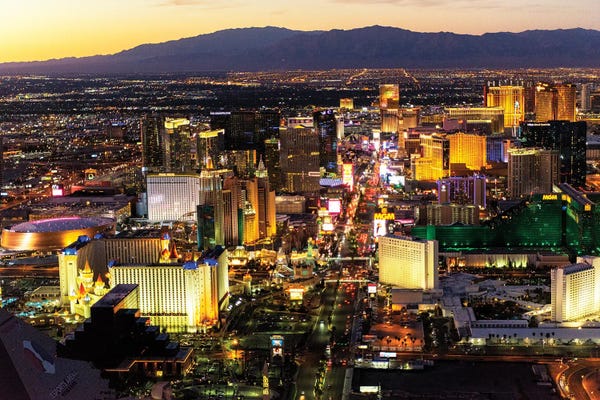 Nevada: American West - Las Vegas Skyline At Dusk by Philippe Hugonnard