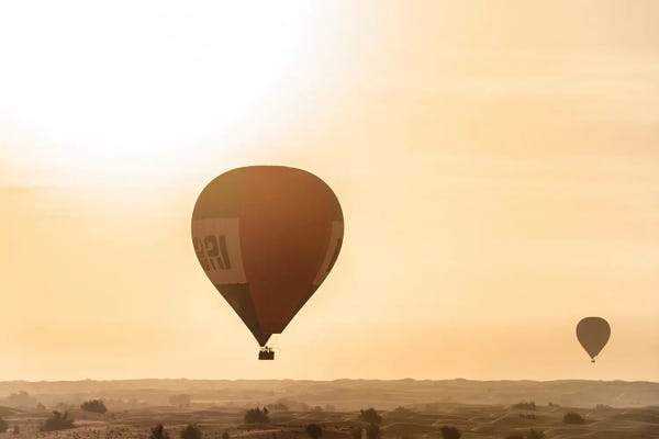 Hot Air Balloons: Dubai UAE - Hot Air Balloons Sunrise by Philippe Hugonnard