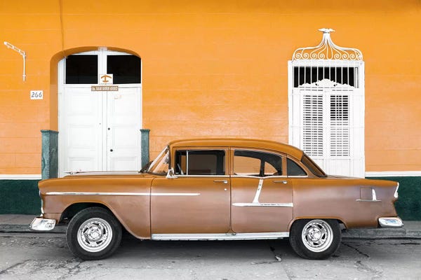 Cuba: Old Orange Car   by Philippe Hugonnard