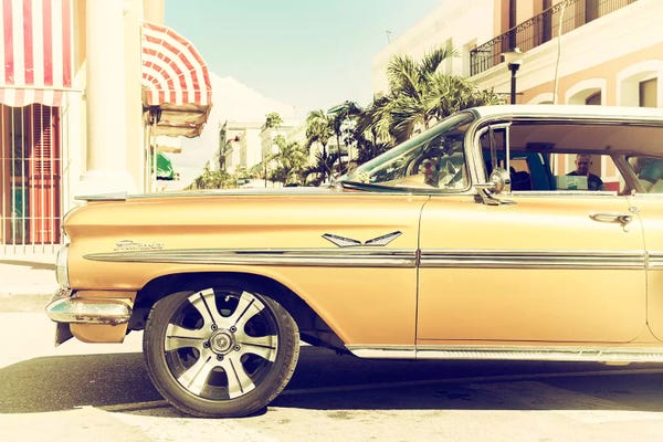 Caribbean: Vintage Yellow Car by Philippe Hugonnard