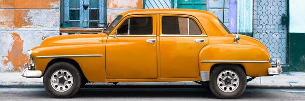 Cuba: Orange Classic American Car by Philippe Hugonnard