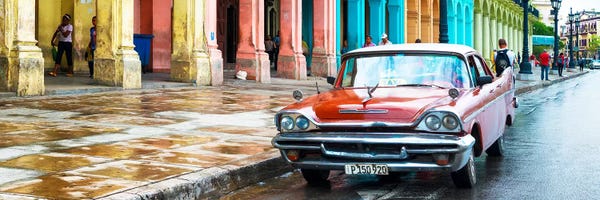 Cuba: Red Taxi of Havana by Philippe Hugonnard