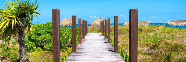 Cuba: Wooden Jetty On The Beach by Philippe Hugonnard
