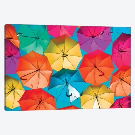 Colourful Umbrellas  - Turquoise Sky Canvas Print #PHD526} by Philippe Hugonnard Canvas Wall Art