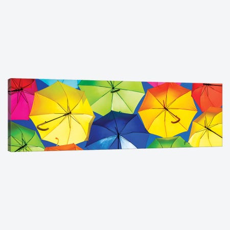 Colourful Umbrellas  - Dark Blue Sky Canvas Print #PHD535} by Philippe Hugonnard Canvas Print