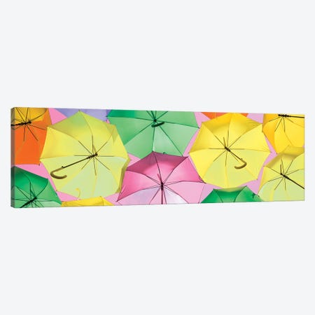 Colourful Umbrellas  - Light Pink Sky Canvas Print #PHD536} by Philippe Hugonnard Canvas Print