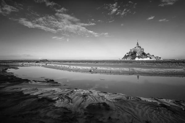 Mont Saint-Michel: Mont Saint Michel Black And White by Philippe Manguin
