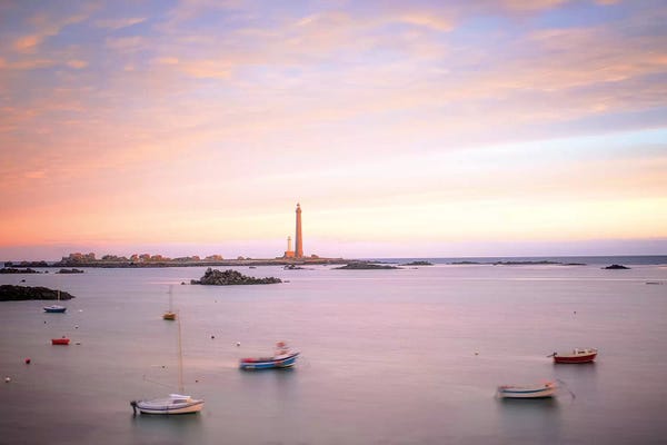 Cloudy Sunsets: Plouguerneau Lighthouse by Philippe Manguin