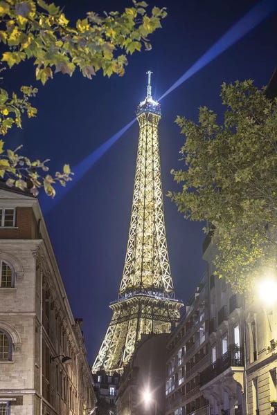 Towers: Eiffel Tower In Paris Street By Night by Philippe Manguin