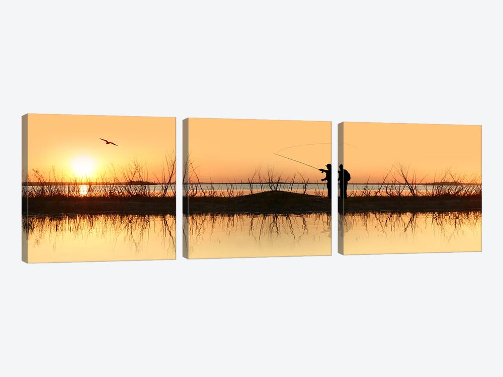 Silhouette of a man fishing by Panoramic Images 3-piece Canvas Print