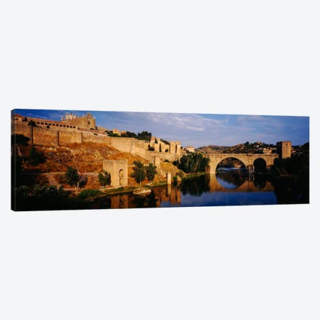 Historic Landscape Along Rio Tajo Featuring Puente de San Martin, Toledo, Spain Canvas Print #PIM1004} by Panoramic Images Canvas Art