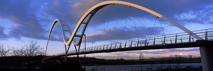 Modern bridge over a riverInfinity Bridge, River Tees, Stockton-On-Tees, Cleveland, England