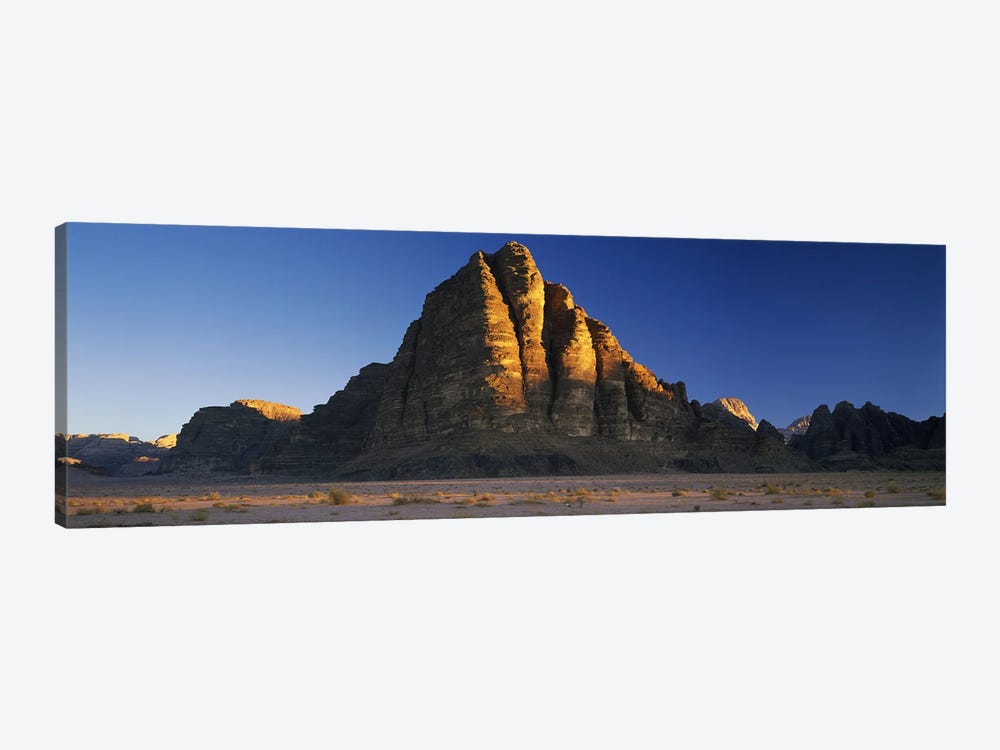Rock formations on a landscapeSeven Pillars of Wisdom, Wadi Rum, Jordan by Panoramic Images 1-piece Canvas Art Print