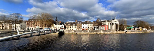 Cork City: The Millenium Foot Bridge Over the River Lee,St Annes Church Behind, And St Mary's Church (right),Cork City, Ireland by Panoramic Images