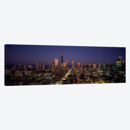 Skyscrapers in a city lit up at dusk, Chicago, Illinois, USA Canvas Print #PIM1015} by Panoramic Images Canvas Print