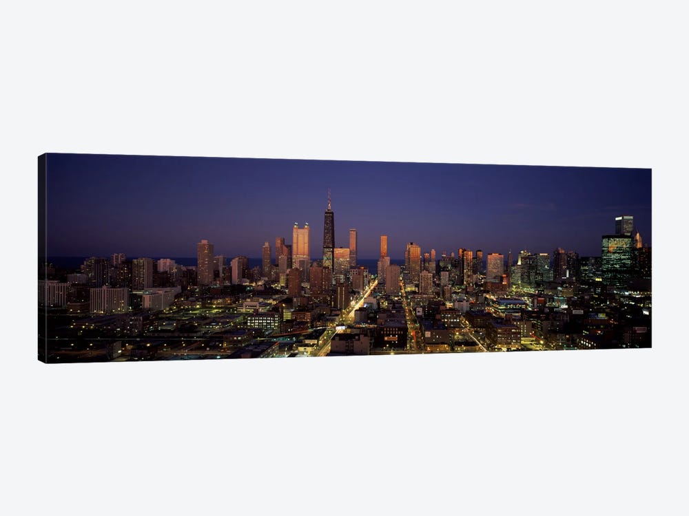 Skyscrapers in a city lit up at dusk, Chicago, Illinois, USA by Panoramic Images 1-piece Canvas Art