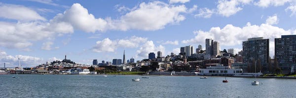 San Francisco Skylines: Distant View Of The Financial District With The Fisherman's Wharf District In The Foreground, San Francisco, California by Panoramic Images