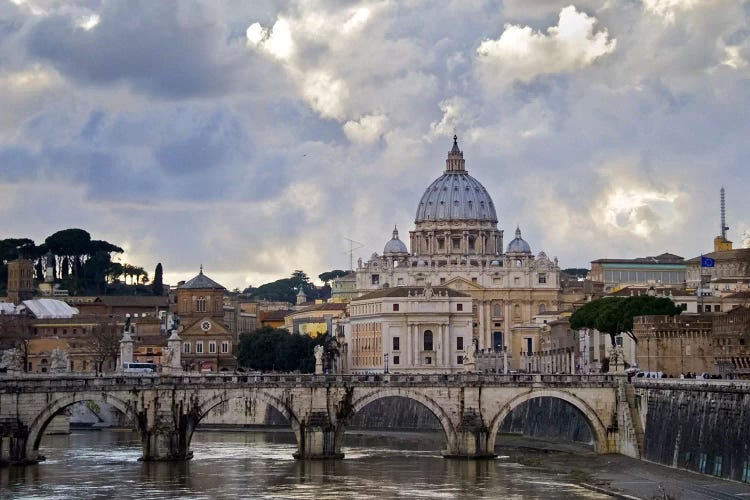 Arch bridge across Tiber River with St. Peter's Basilica in the background, Rome, Lazio, Italy