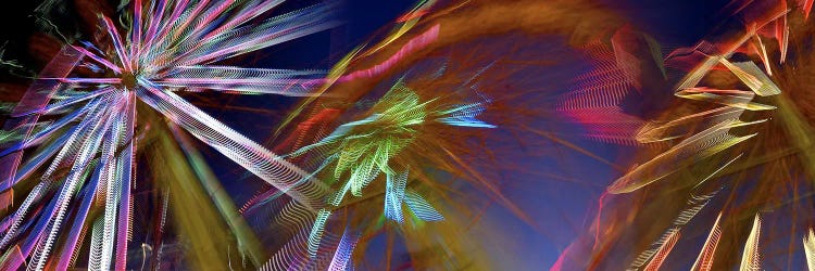 Ferris wheel spinning at night