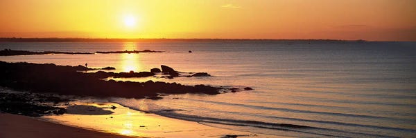 Ocean Sunrises & Sunsets: Sunrise over the beach, Beg Meil, Finistere, Brittany, France by Panoramic Images