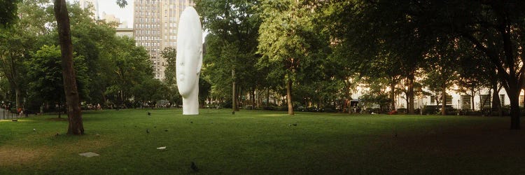 Large head sculpture in a park, Madison Square Park, Madison Square, Manhattan, New York City, New York State, USA