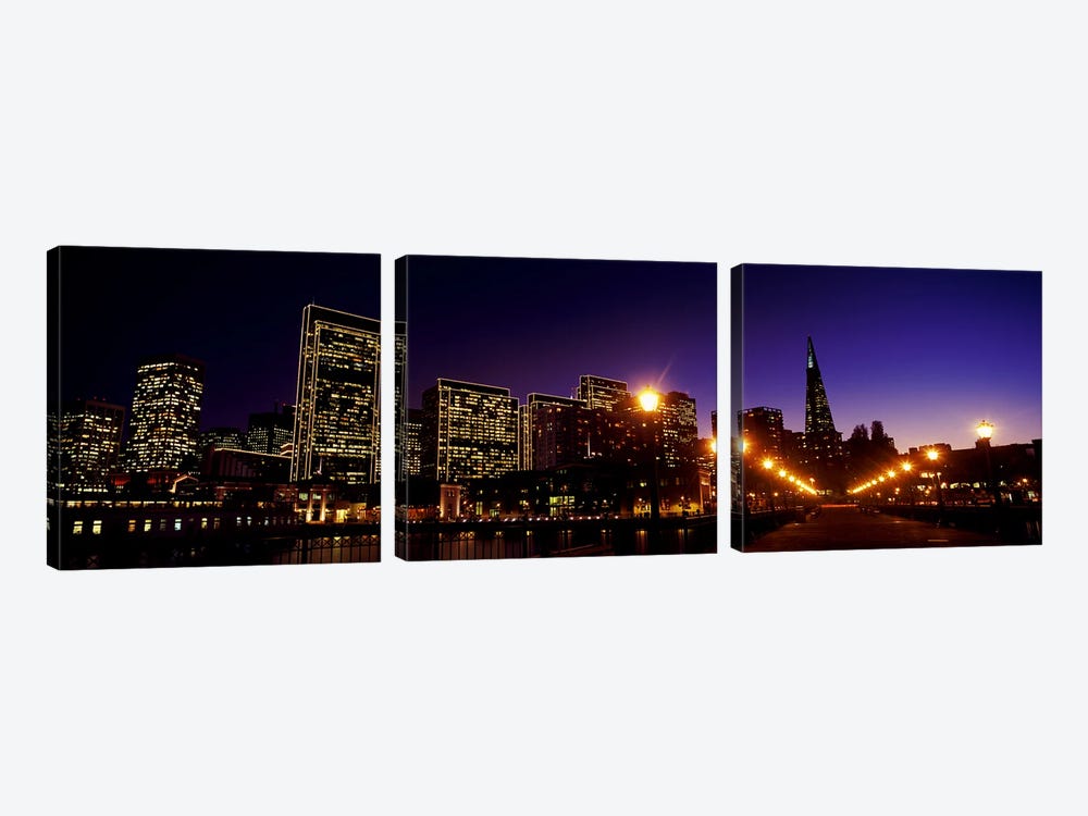 Buildings at the waterfront lit up at dusk, San Francisco, California, USA by Panoramic Images 3-piece Canvas Artwork