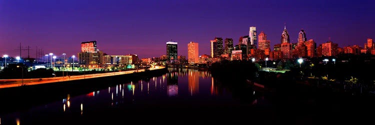 Buildings lit up at the waterfront, Philadelphia, Schuylkill River, Pennsylvania, USA