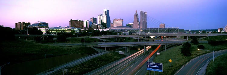 Highway interchange and skyline at sunset, Kansas City, Missouri, USA