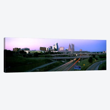 Highway interchange and skyline at sunset, Kansas City, Missouri, USA Canvas Print #PIM10583} by Panoramic Images Art Print