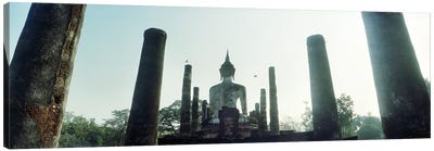 Statue of Buddha at a temple, Sukhothai Historical Park, Sukhothai, Thailand Canvas Art Print