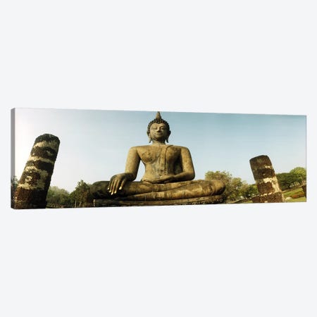 Low angle view of a statue of Buddha, Sukhothai Historical Park, Sukhothai, Thailand Canvas Print #PIM10603} by Panoramic Images Canvas Wall Art