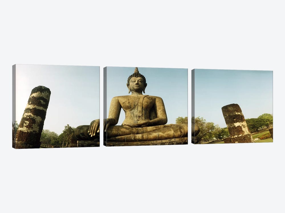 Low angle view of a statue of Buddha, Sukhothai Historical Park, Sukhothai, Thailand by Panoramic Images 3-piece Canvas Print