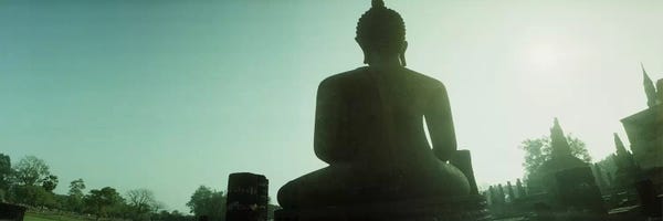 Low angle view of a statue of Buddha II, Sukhothai Historical Park, Sukhothai, Thailand